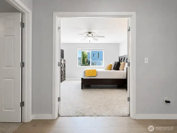 French doors leading into Primary Bedroom