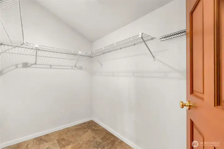 1 of 2 Walkin closets in primary