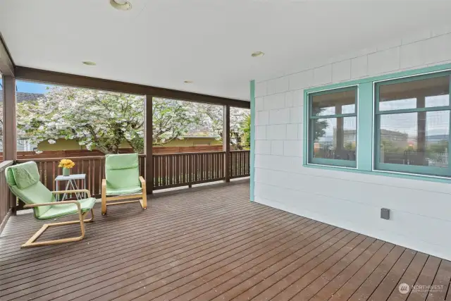 Let's start out with a large wrap around covered porch with Commencement Bay views.