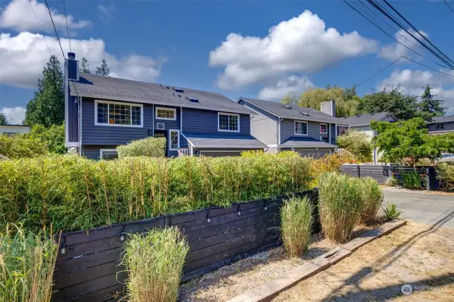 Beautifully fenced front yard provides both privacy and security, creating a serene and secure retreat.