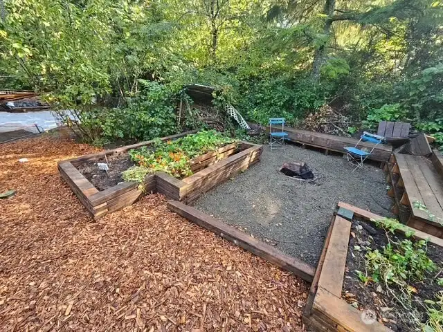 The firepit area is awaiting your smores enjoyment!