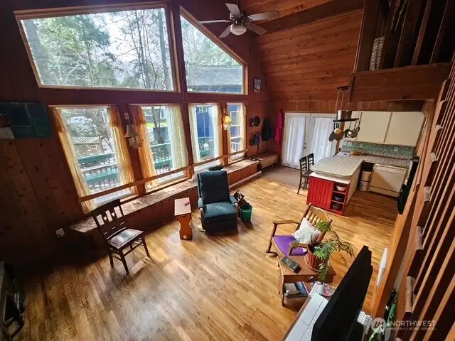 Looking down from the loft at the living room and part of the kitchen.