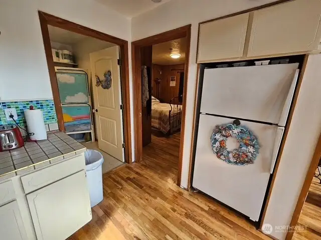 Primary bedroom and bathroom/utility room on the main floor.