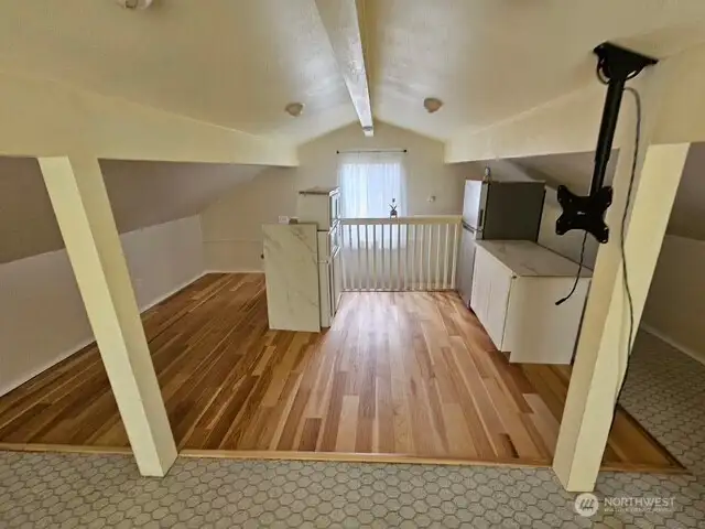 Bonus room above the garage.  Great place for a playroom or several bunk beds.