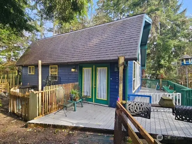 All-weather deck on 3 sides of the home.