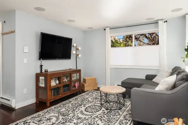 The living room has built in speakers to enchance your tv watching experience.