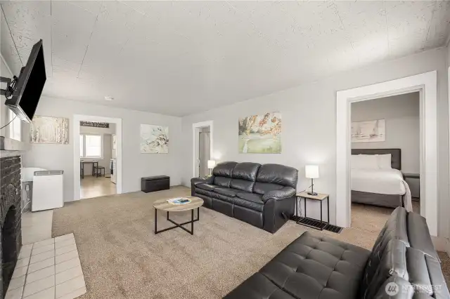 Front Living / Family Room leading to bedrooms, Kitchen and 3/4 Bathroom.