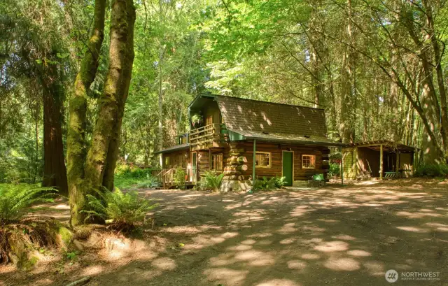 Welcome to Seatter Road in Kingston.  A private lane leads to 2+ acres of privacy.  Log cabin built in 1980 has fairy tale ambiance with its balcony deck, woodland surroundings and Dutch door.