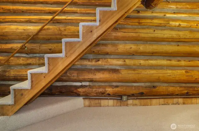 Stair leading to upper bedroom.