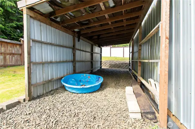 Covered area behind shop for extra toys