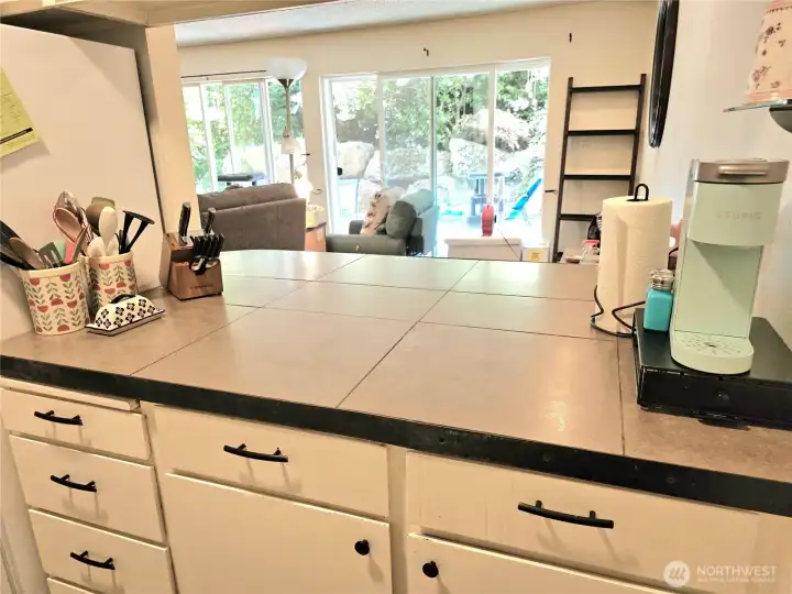 The counterspace allows access to the additional dining area.