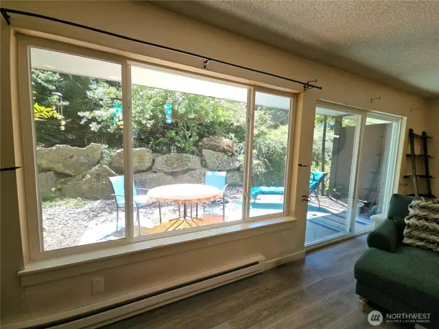 A wall of windows creates an extension from inside to outside, adding to your total living space!