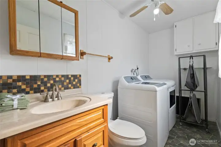 Utility room and half bath