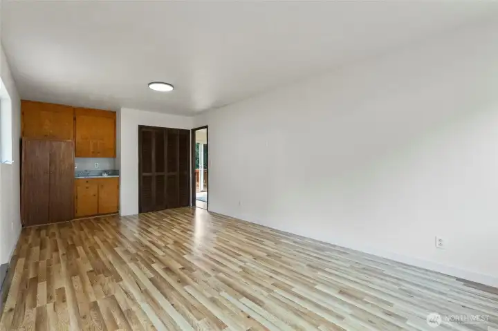 Huge multi-purpose room with sink/cabinets