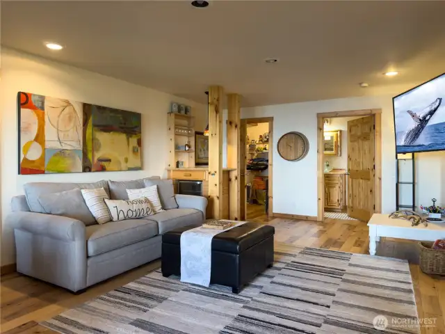 Rec Room with Bar, Storage, Bathroom, Game Room, and large Bedroom