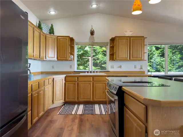 The spacious kitchen offers ample counter space and storage.