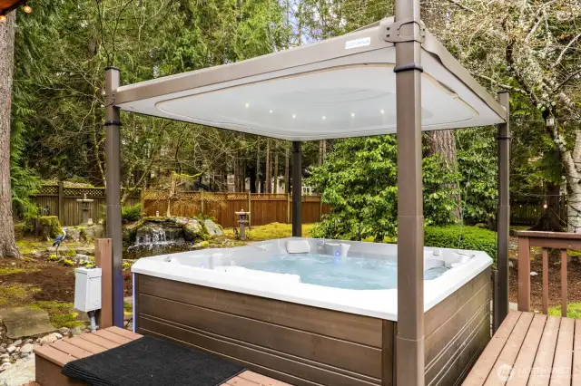8 person salt water hot tub with Covana auto cover.
