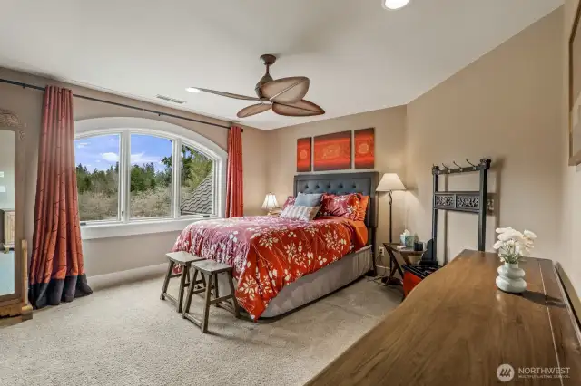 One of 3 other large bedrooms suites upstairs.