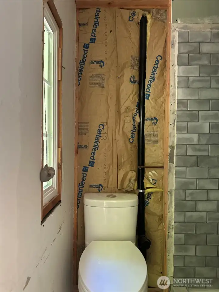 Unfinshed bathroom.
