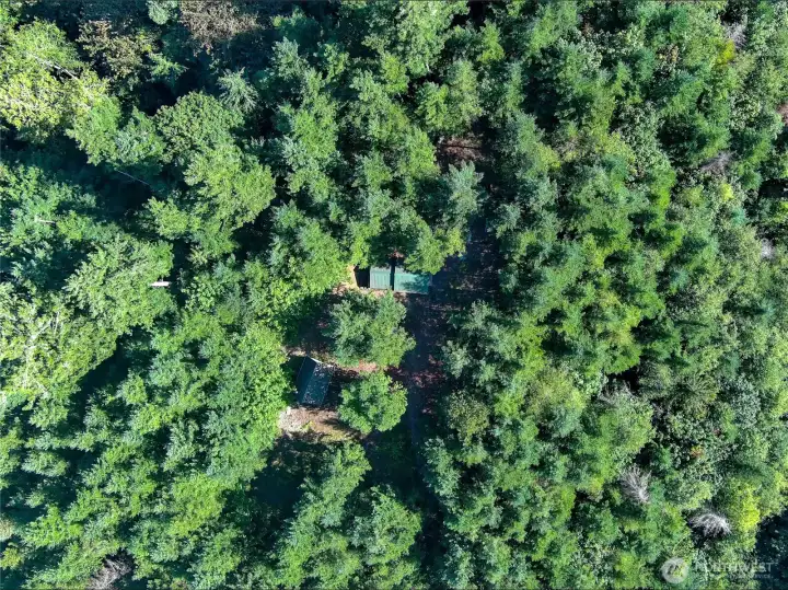 Aerial of tiny home and shop.