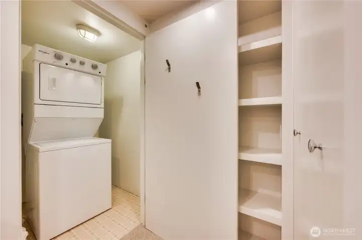 Off the den office space is the laundry conveniently tucked away.