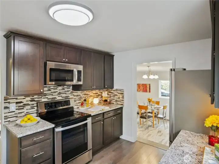 Open kitchen layout leading into a welcoming dining area—great for entertaining and everyday meals.