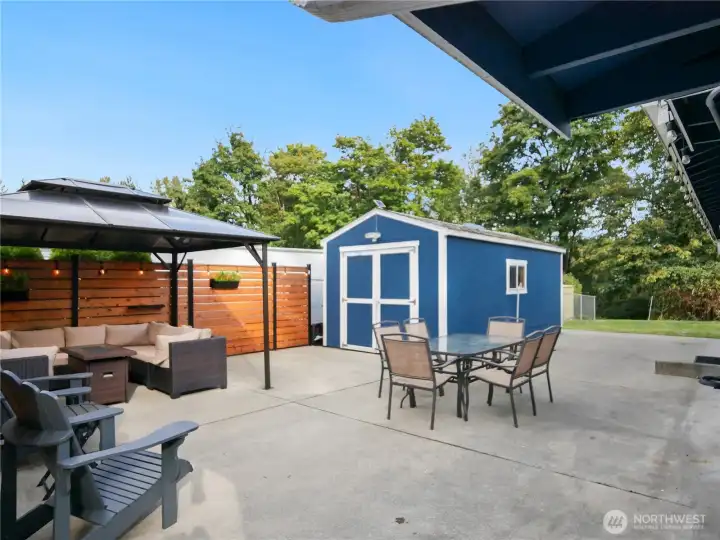 Convenient blue shed for all your storage needs.