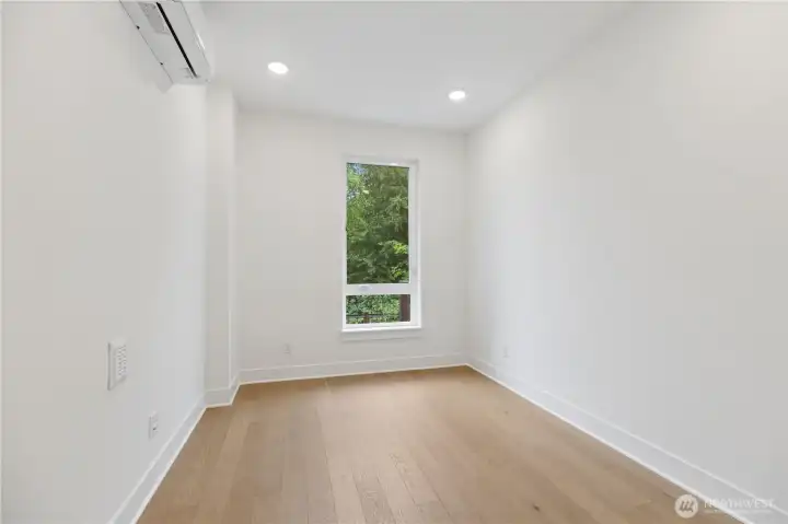 Entry level bedroom with greenspace views!