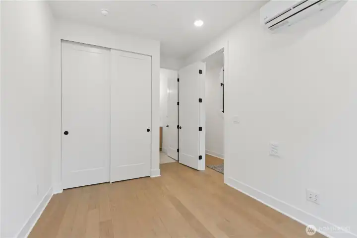 Entry level bedroom with ensuite bathroom.