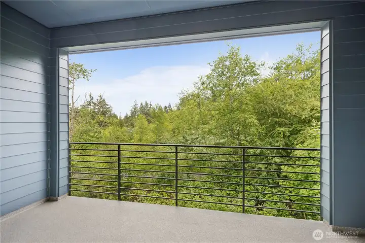 Balcony overlooking lush greenspace