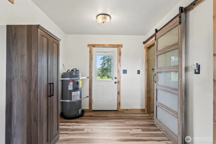 Side entry. Large mud room