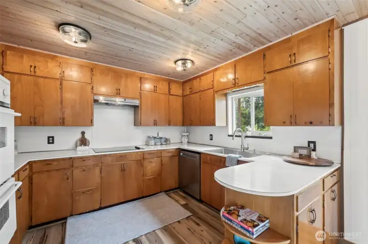 The charm of this farmhouse kitchen is off of the chart. These cabinets were custom made in Yelm. They are incredibly solid!