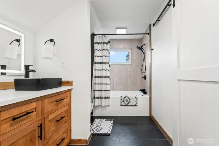 The upstairs bathroom. Gorgeously remodeled!!