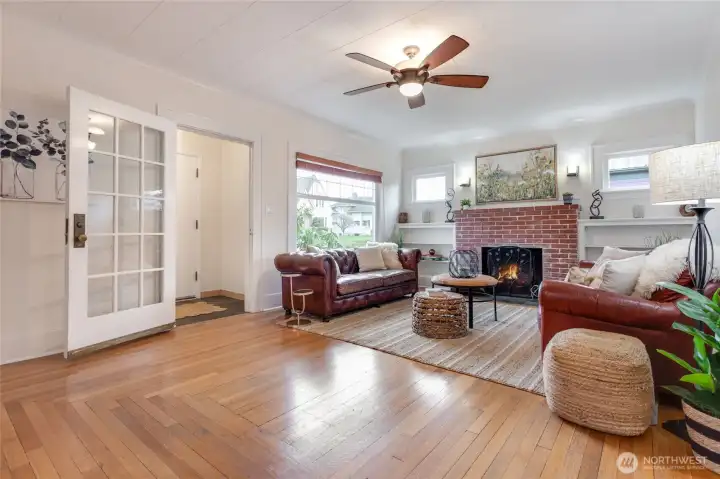 Living room with doorway to front foyer