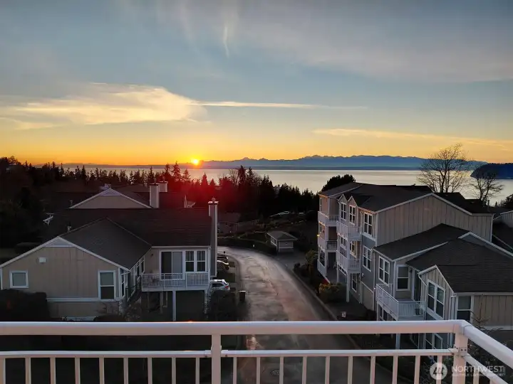 Enjoy beautiful sunsets over the Olympics from your main floor deck.