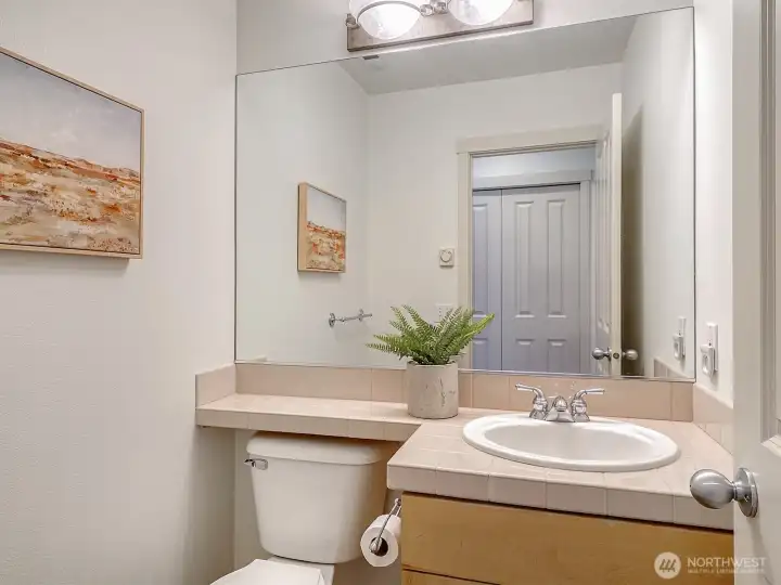 The half bath on main floor off the entry.