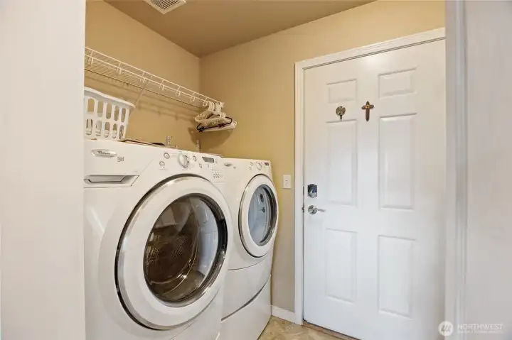 Laundry, opposite wall has built in cabinets