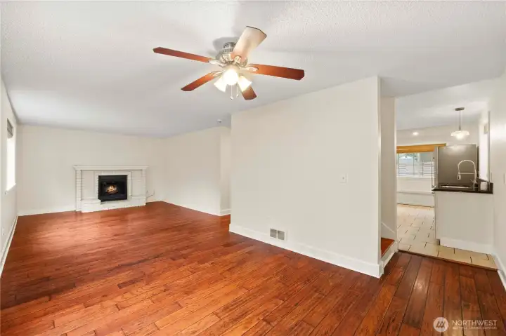 The gorgeous hardwood floors continue throughout the family room and dining room.