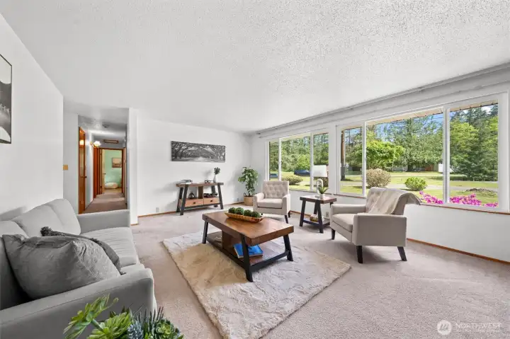 Inviting living room with picturesque windows. Inviting living room with picturesque windows.
