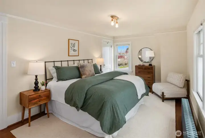 Spacious primary bedroom with king bed.