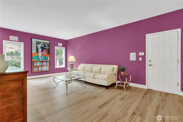 Family/media room with bookcase and wet bar.