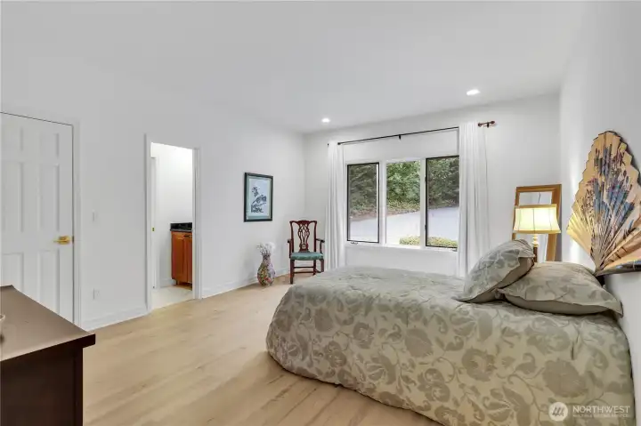 Guest bedroom has continental bath.