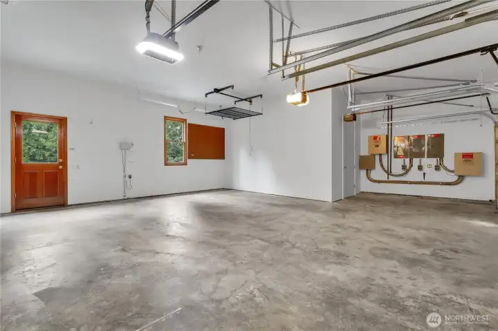 3 car garage has locking storage closet that seller will remove if requested.