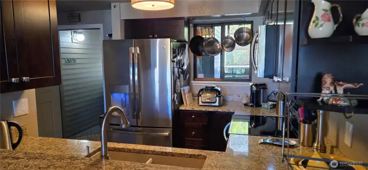 Kitchen looking into Living area