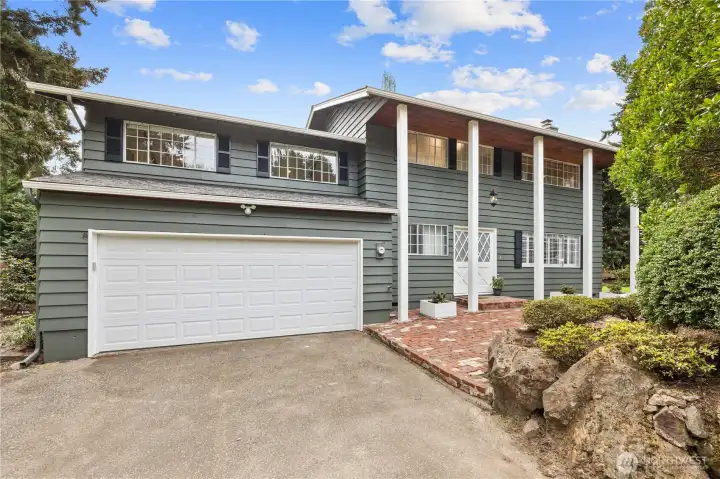 Welcome home to this Matthews Beach retreat!