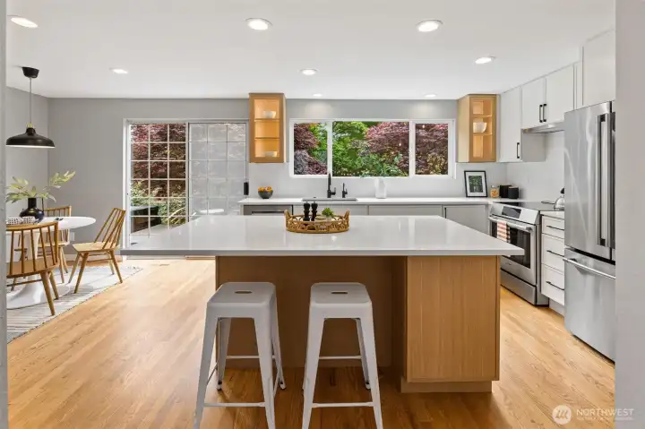 Sunlight pours through expansive windows.