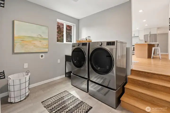 The redesigned laundry room offers ample working space.
