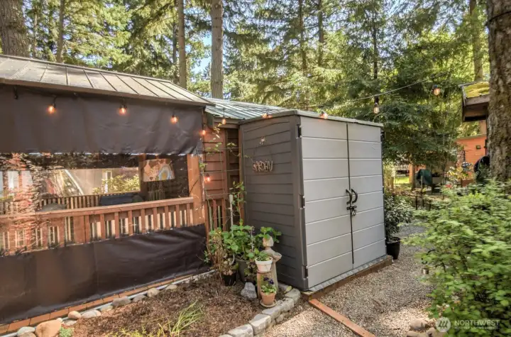 BACK AREA WITH EXTRA SMALL SHED FOR TOOLS ETC.