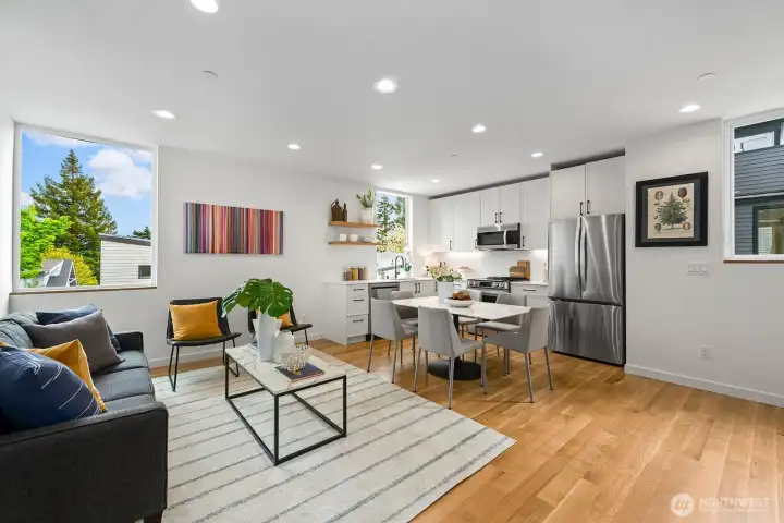 Real hardwood floors and well placed windows provide ample natural light and privacy.