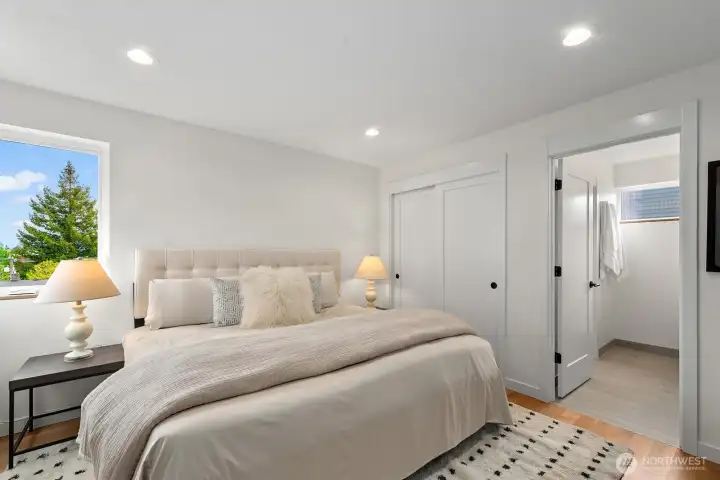 Primary bedroom with en-suite spa-like bathroom.